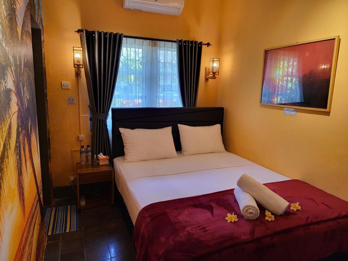 מטאראם Dewi Sri Guesthouse מראה חיצוני תמונה